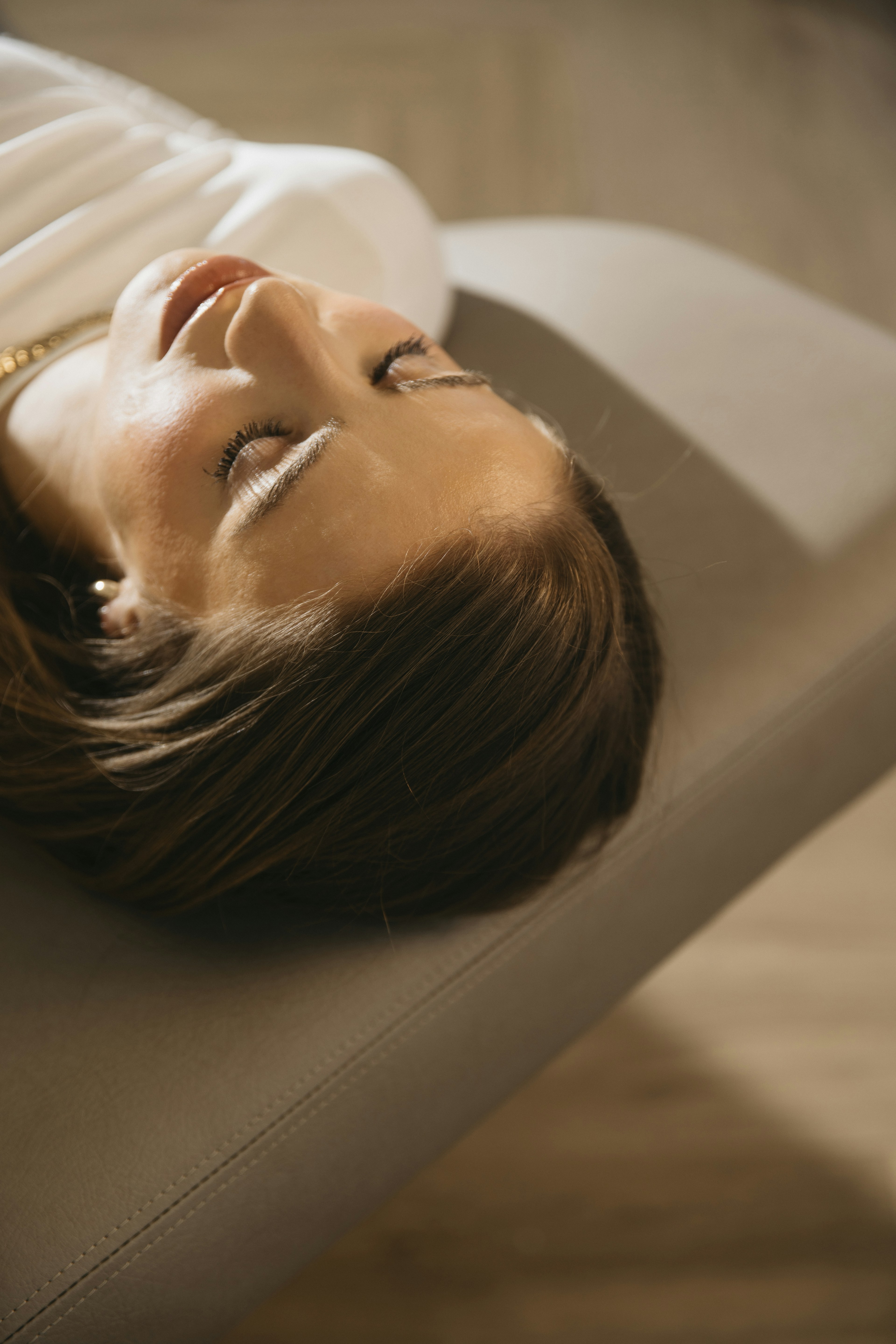 A guest resting with eyes closed