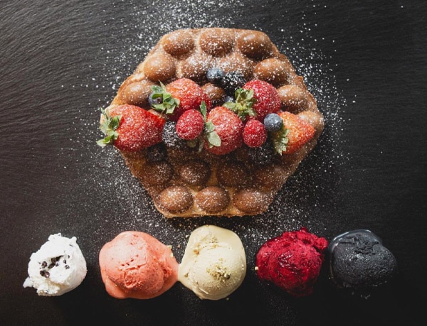 Bubble waffle with berries and gelato